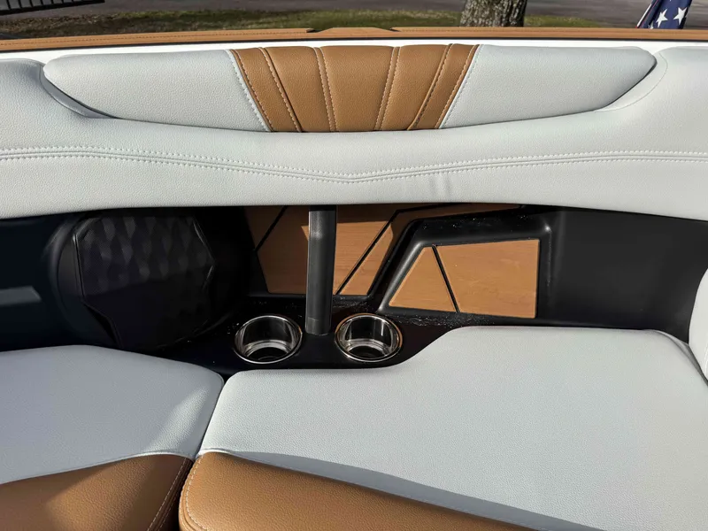 Slide: The Image of 2026 Malibu Wakesetter 22 LSV interior with stylish seating and cup holders. - 28