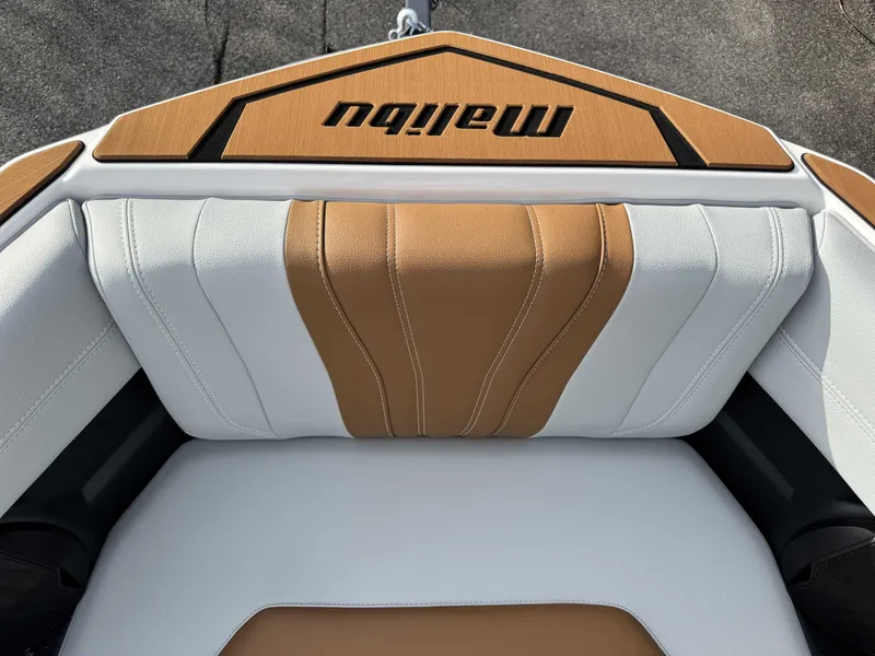 Slide: The Image of 2026 Malibu Wakesetter 22 LSV, luxurious white and brown interior seating. - 29