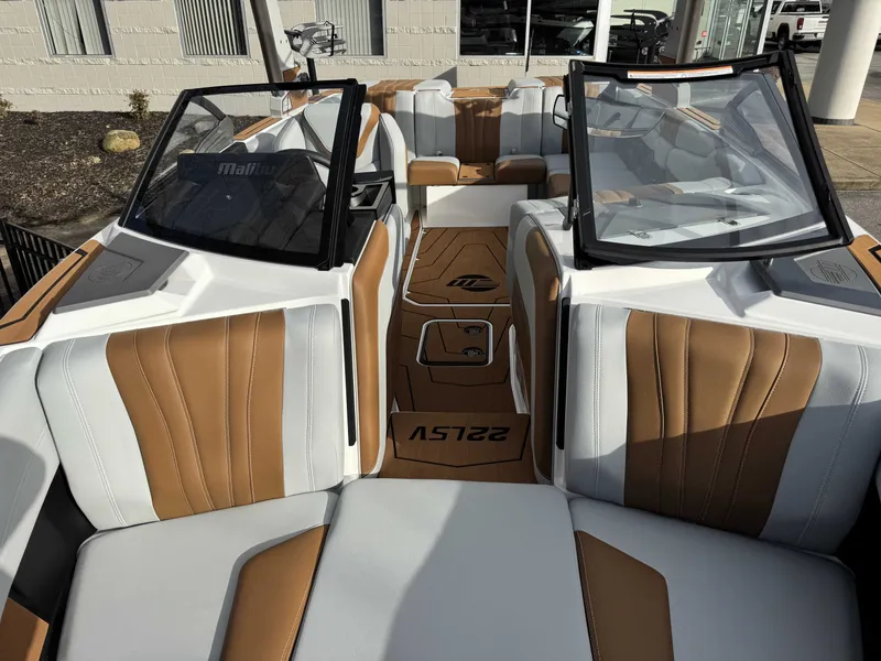 Slide: The Image of Interior of 2026 Malibu Wakesetter 22 LSV with brown and white seats. - 31