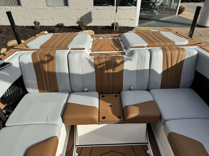 Slide: The Image of 2026 Malibu Wakesetter 22 LSV interior with brown and white seating. - 37