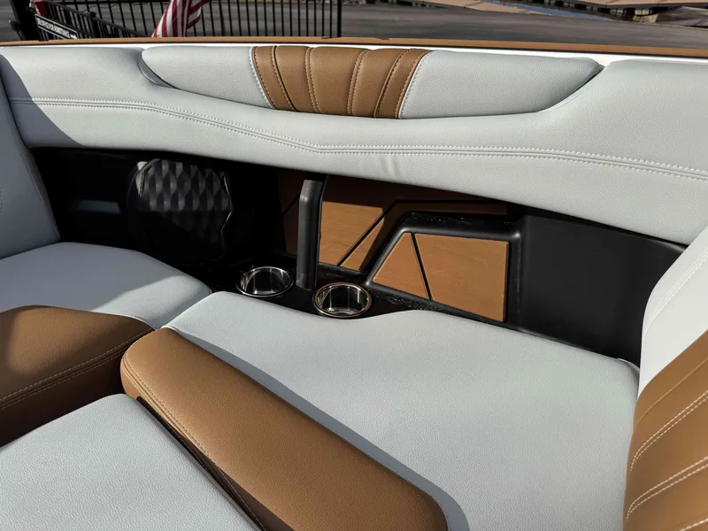Slide: The Image of Interior of 2026 Malibu Wakesetter 22 LSV with brown and gray seating. - 7