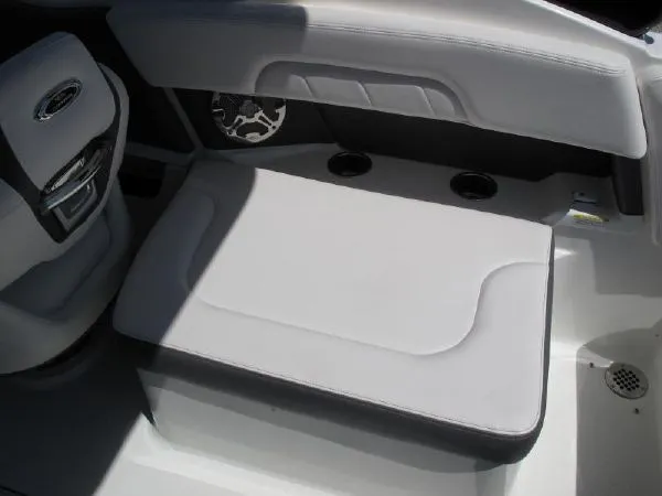Slide: The Image of Seating area of 2023 SAMPLE New Boat with white upholstery. - 11