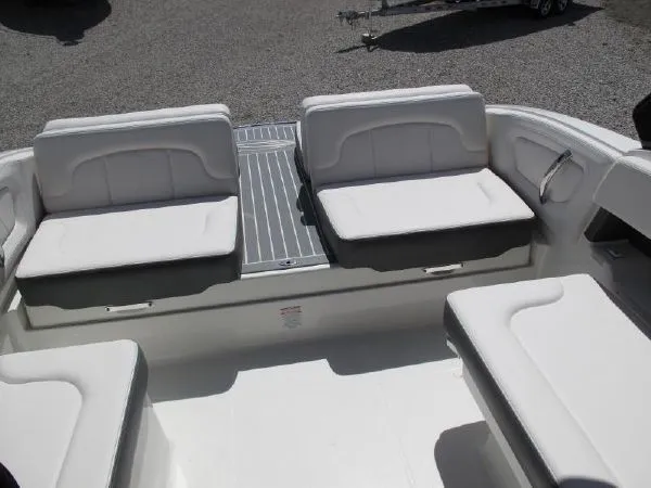 Slide: The Image of Interior view of a new boat with white seats, model 2023. - 12