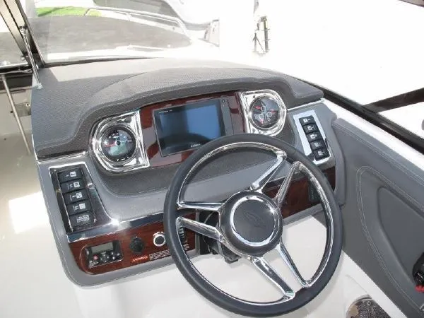 Slide: The Image of 2023 SAMPLE New Boat steering console with modern instruments. - 3
