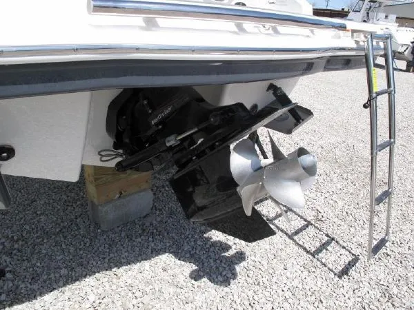 Slide: The Image of Rear view of 2023 SAMPLE New Boat with outboard motor. - 4