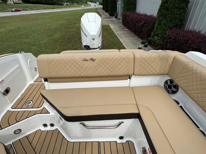 Slide: The Image of Interior of a 2026 Sea Ray SDO 230 with beige upholstery. - 10