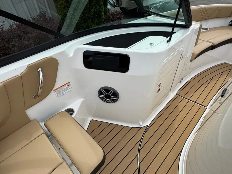 Slide: The Image of Interior of 2026 Sea Ray SDO 230 yacht with elegant seating. - 13