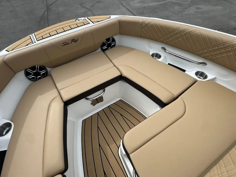 Slide: The Image of Interior of 2026 Sea Ray SDO 230 boat with beige upholstery. - 14