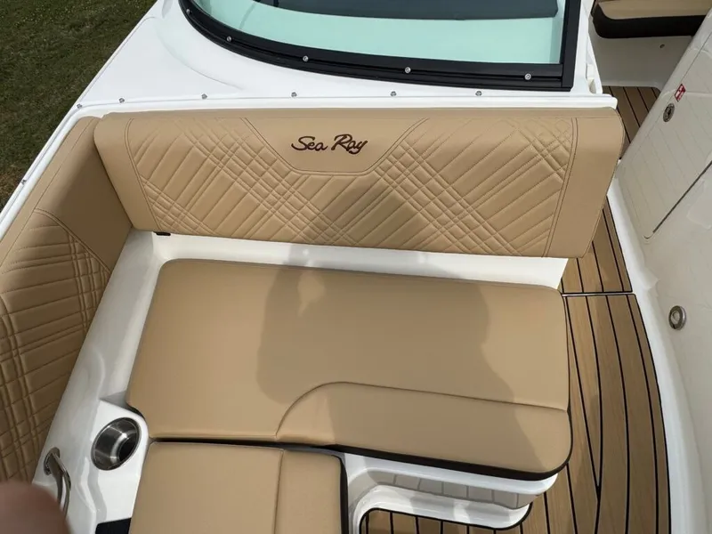 Slide: The Image of Interior of Sea Ray SDO 230 boat, 2026 model, featuring beige upholstery. - 16
