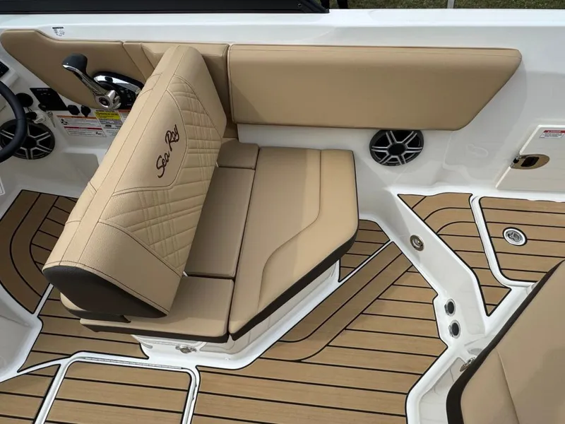 Slide: The Image of Interior of 2026 Sea Ray SDO 230 boat with beige upholstery. - 19