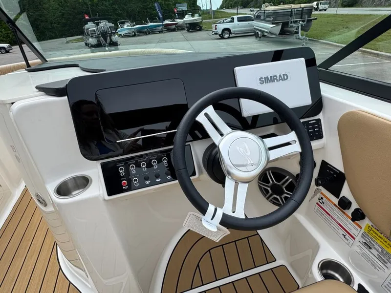 Slide: The Image of Sea Ray SDO 230 helm with Simrad display, 2026 model. - 22