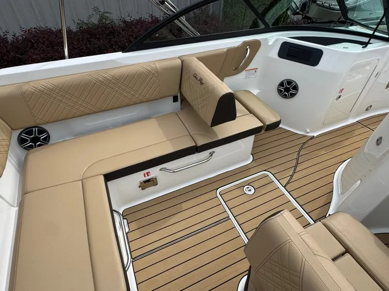 Slide: The Image of Interior of 2026 Sea Ray SDO 230 yacht with luxurious seating. - 25
