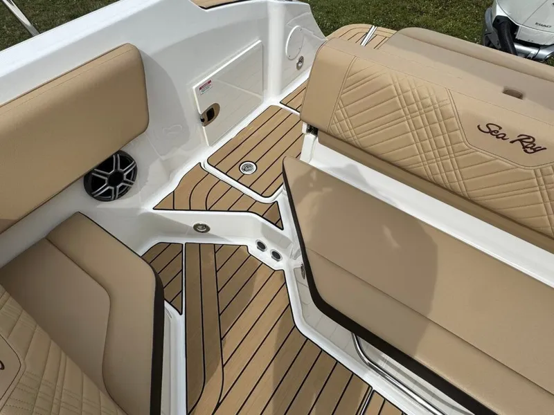 Slide: The Image of Interior of 2026 Sea Ray SDO 230 boat with beige seating. - 26
