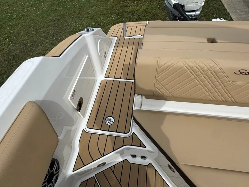 Slide: The Image of 2026 Sea Ray SDO 230 boat with sleek upholstery and deck design. - 27