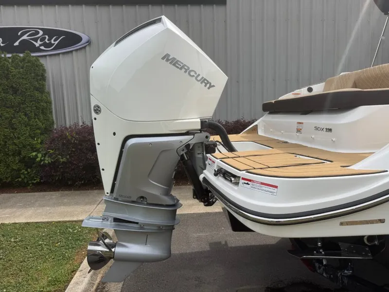 Slide: The Image of 2026 Sea Ray SDO 230 with Mercury outboard motor. - 4