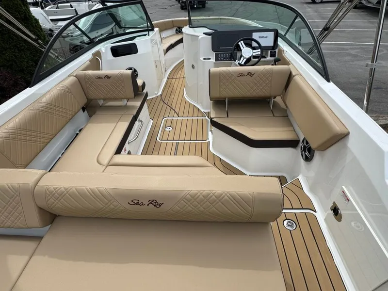 Slide: The Image of Interior of 2026 Sea Ray SDO 230 boat with luxurious seating. - 9