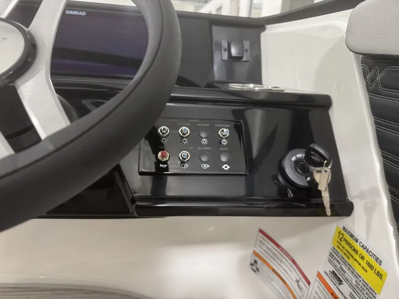 Slide: The Image of Dashboard of Sea Ray SPO210 boat, model year 2026. - 12