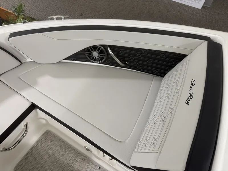 Slide: The Image of Interior of Sea Ray SPO210 boat, 2026 model, featuring elegant white upholstery. - 17