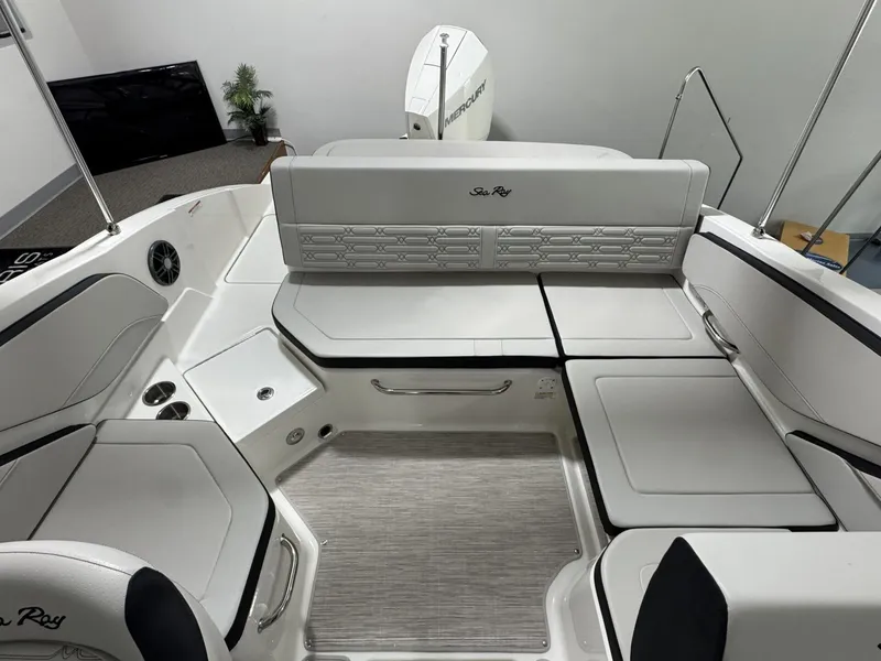 Slide: The Image of Interior of 2026 Sea Ray SPO210 boat with sleek seating. - 20