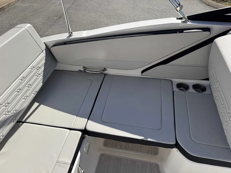 Slide: The Image of Interior of 2026 Sea Ray SPO210 boat with gray upholstery. - 21