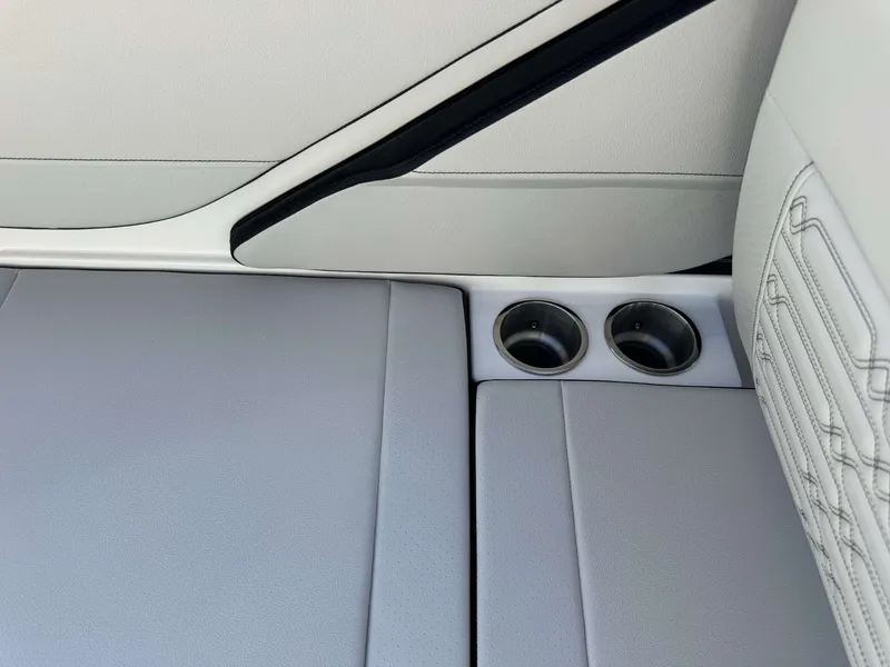 Slide: The Image of Interior of 2026 Sea Ray SPO210 with cup holders. - 23