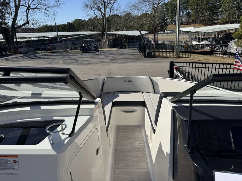 Slide: The Image of Interior view of Sea Ray SPO210 boat, 2026 model, at a parking area. - 25