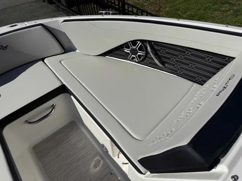 Slide: The Image of Interior of 2026 Sea Ray SPO210 boat with sleek seating. - 28