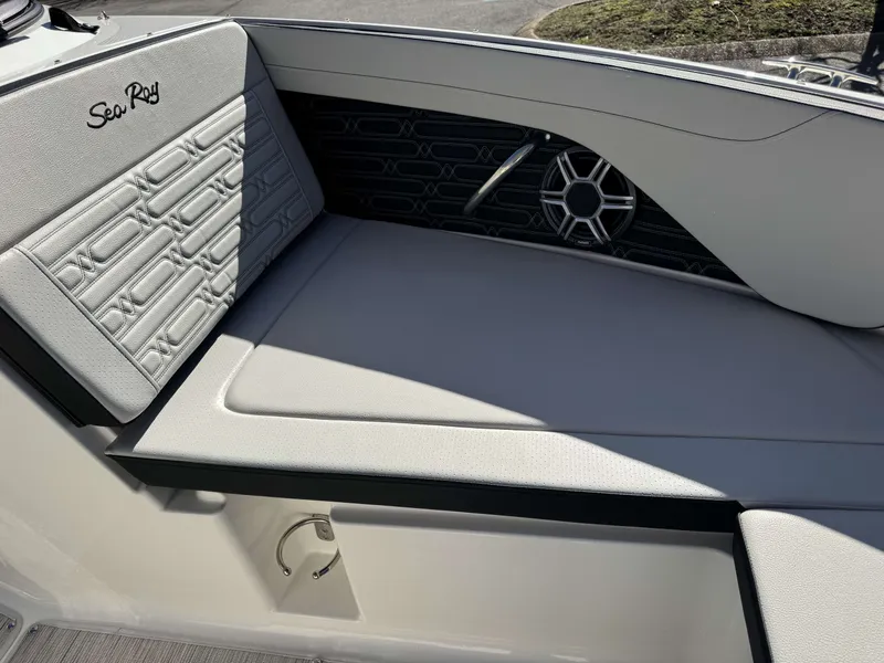 Slide: The Image of Interior of 2026 Sea Ray SPO210 boat with cushioned seating. - 3