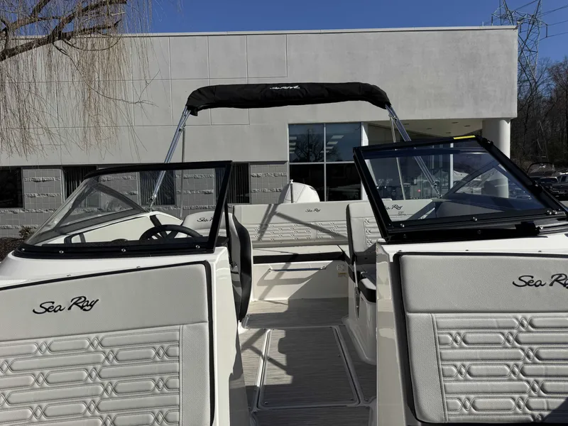 Slide: The Image of 2026 Sea Ray SPO210 boat with open cockpit and sleek seating. - 36
