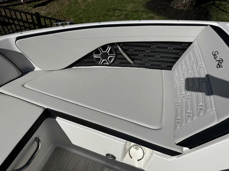 Slide: The Image of Interior of 2026 Sea Ray SPO210 boat with luxurious upholstery. - 38