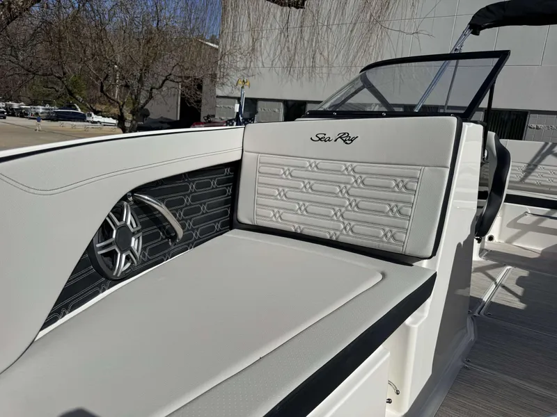 Slide: The Image of Interior of 2026 Sea Ray SPO210 boat with stylish seating design. - 4