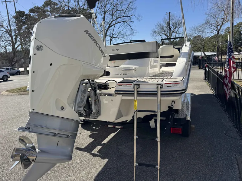 Slide: The Image of 2026 Sea Ray SPO210 boat with Mercury outboard motor. - 7