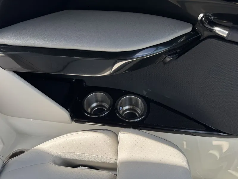 Slide: The Image of Interior of 2026 Sea Ray SXO260 with cup holders. - 12