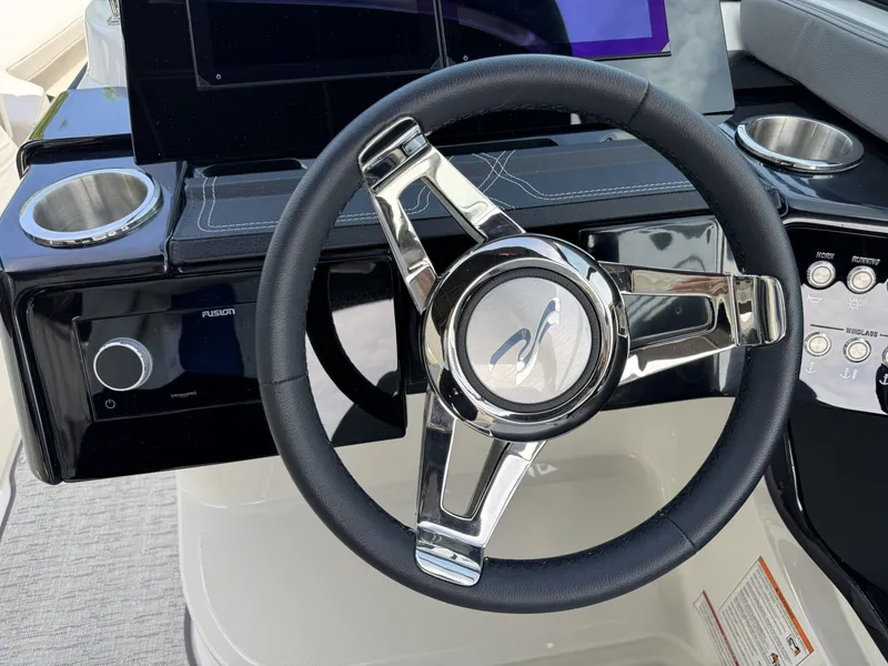 Slide: The Image of Steering wheel of Sea Ray SXO260 boat, model 2026. - 19