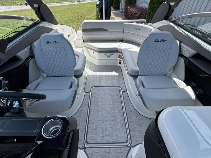 Slide: The Image of Interior of Sea Ray SXO260 boat, luxurious seating, modern design, year 2026. - 25