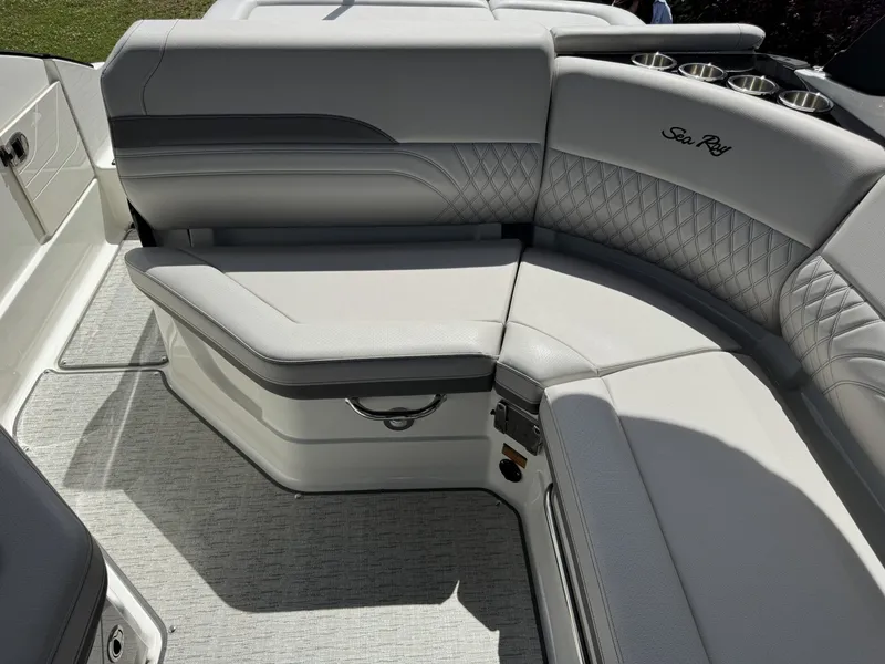 Slide: The Image of Interior of Sea Ray SXO260 yacht, luxurious seating, model year 2026. - 8
