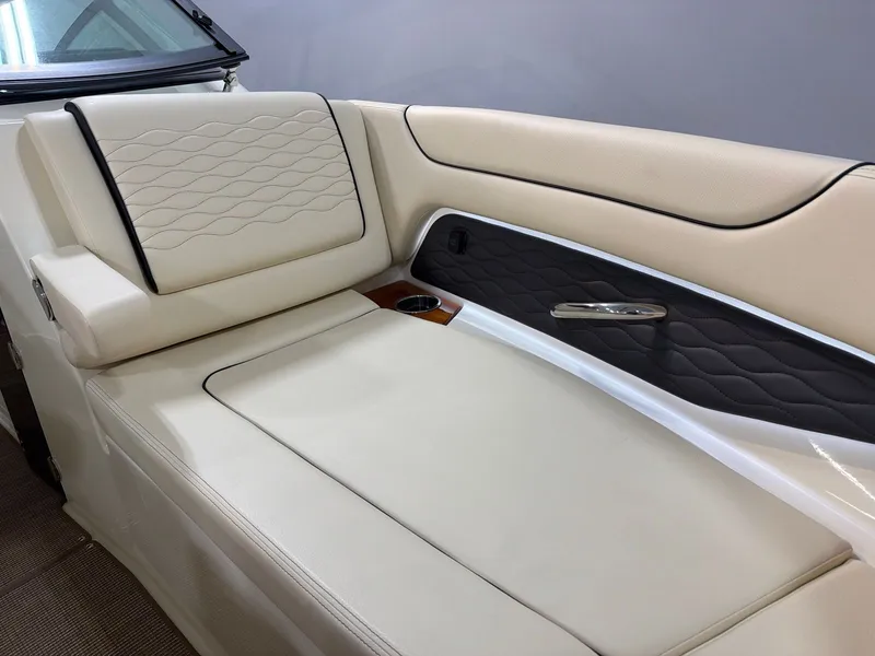 Slide: The Image of Interior of 2026 Chris-Craft Sportster 28 with luxurious upholstery. - 11