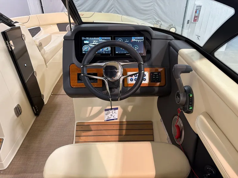 Slide: The Image of Interior view of 2026 Chris-Craft Sportster 28 with modern dashboard. - 18