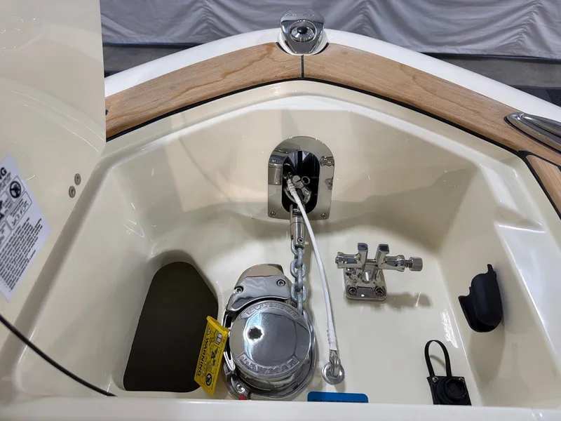 Slide: The Image of Chris-Craft Sportster 28 2026 anchor compartment with stainless steel fittings. - 21