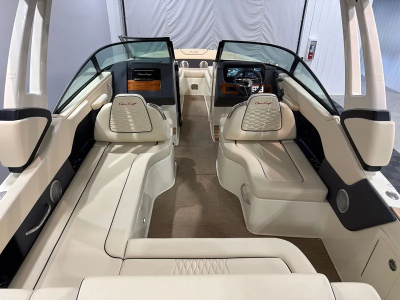 Slide: The Image of Interior of 2026 Chris-Craft Sportster 28 with luxurious seating and dashboard. - 7