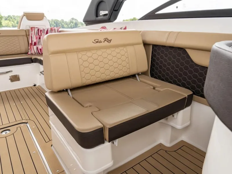 Slide: The Image of Interior of Sea Ray SDX 290 boat, 2025 model, featuring beige seating. - 4