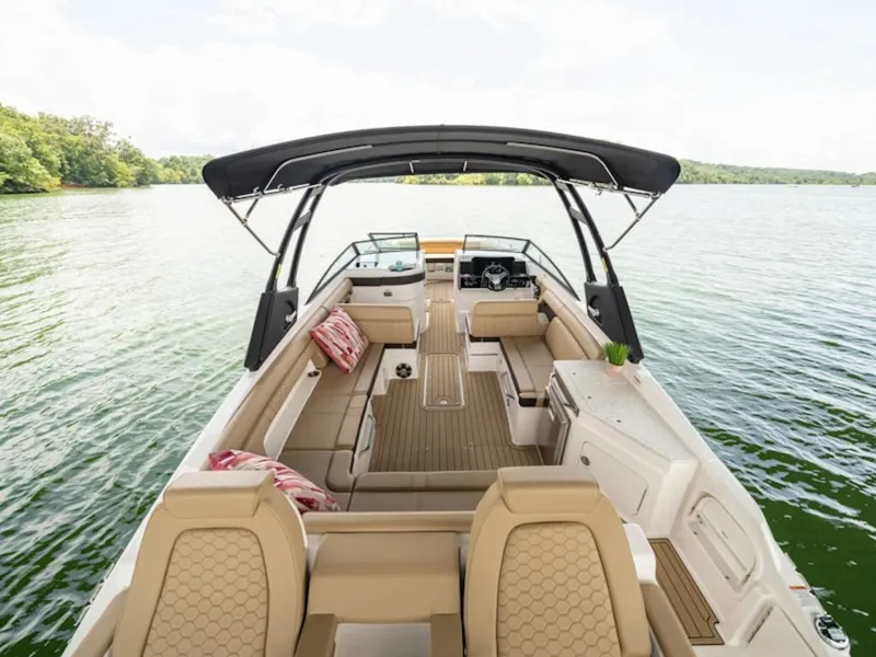 Slide: The Image of Interior view of 2025 Sea Ray SDX 290 yacht on a tranquil lake. - 8