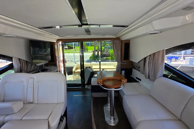 Slide: The Image of Luxurious interior of 2018 Sea Ray Sundancer 510 yacht with plush seating and modern amenities. - 14