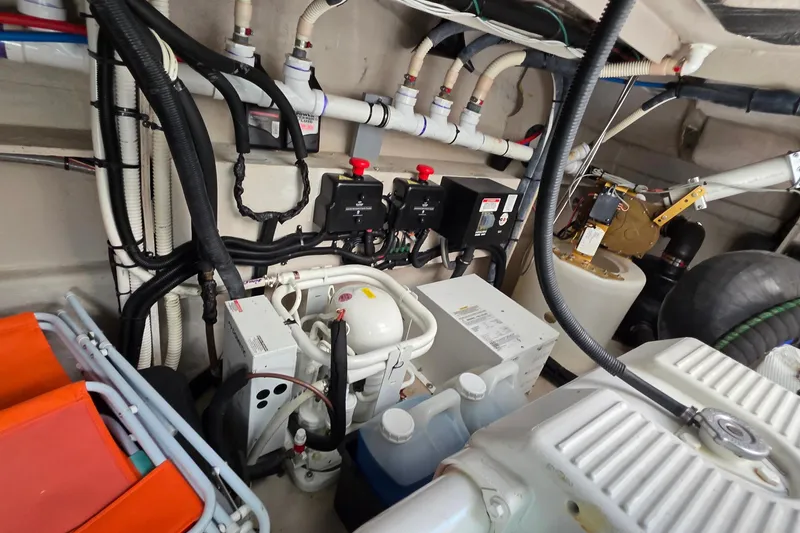 Slide: The Image of Engine room of 2018 Sea Ray Sundancer 510 with mechanical systems and wiring. - 22