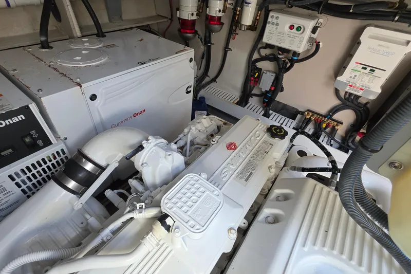 Slide: The Image of Engine room of 2018 Sea Ray Sundancer 510 with Cummins Onan generator and wiring. - 27