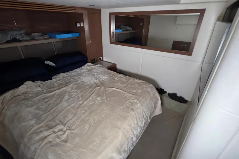 Slide: The Image of Luxurious bedroom interior of 2018 Sea Ray Sundancer 510 yacht with cozy bedding. - 53