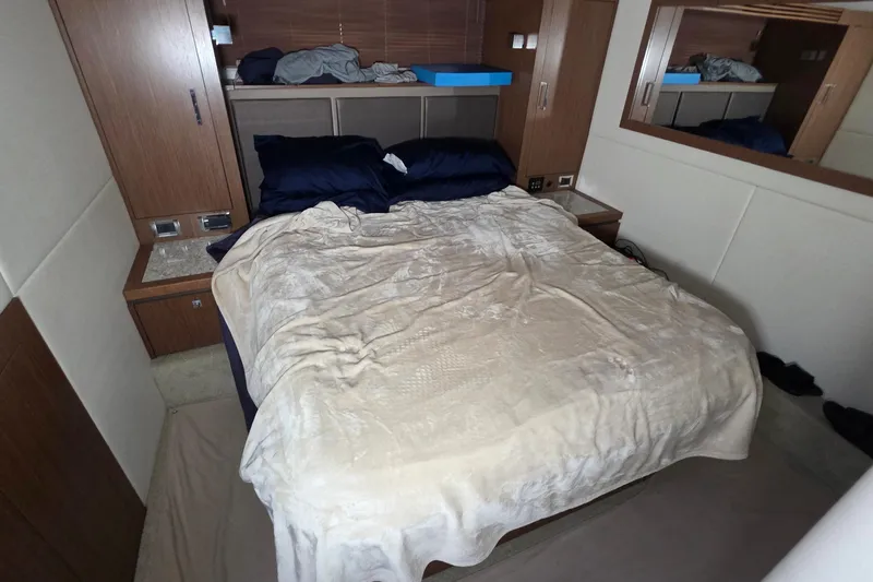 Slide: The Image of Luxurious bedroom interior of 2018 Sea Ray Sundancer 510 yacht with cozy bedding. - 56