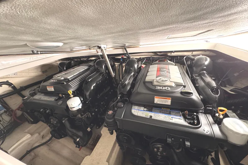 Slide: The Image of Twin engines in a 2016 Formula 310 Bowrider boat engine compartment. - 24