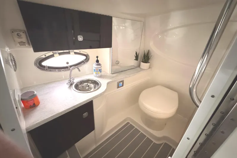 Slide: The Image of Luxurious bathroom interior of 2016 Formula 310 Bowrider boat with modern amenities. - 27