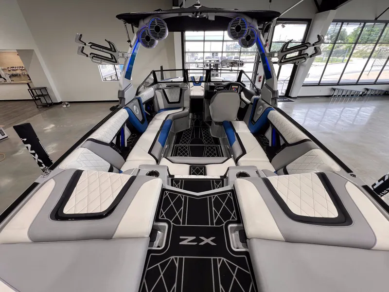 Slide: The Image of Interior of 2021 Tigé 25ZX boat with luxurious seating. - 11